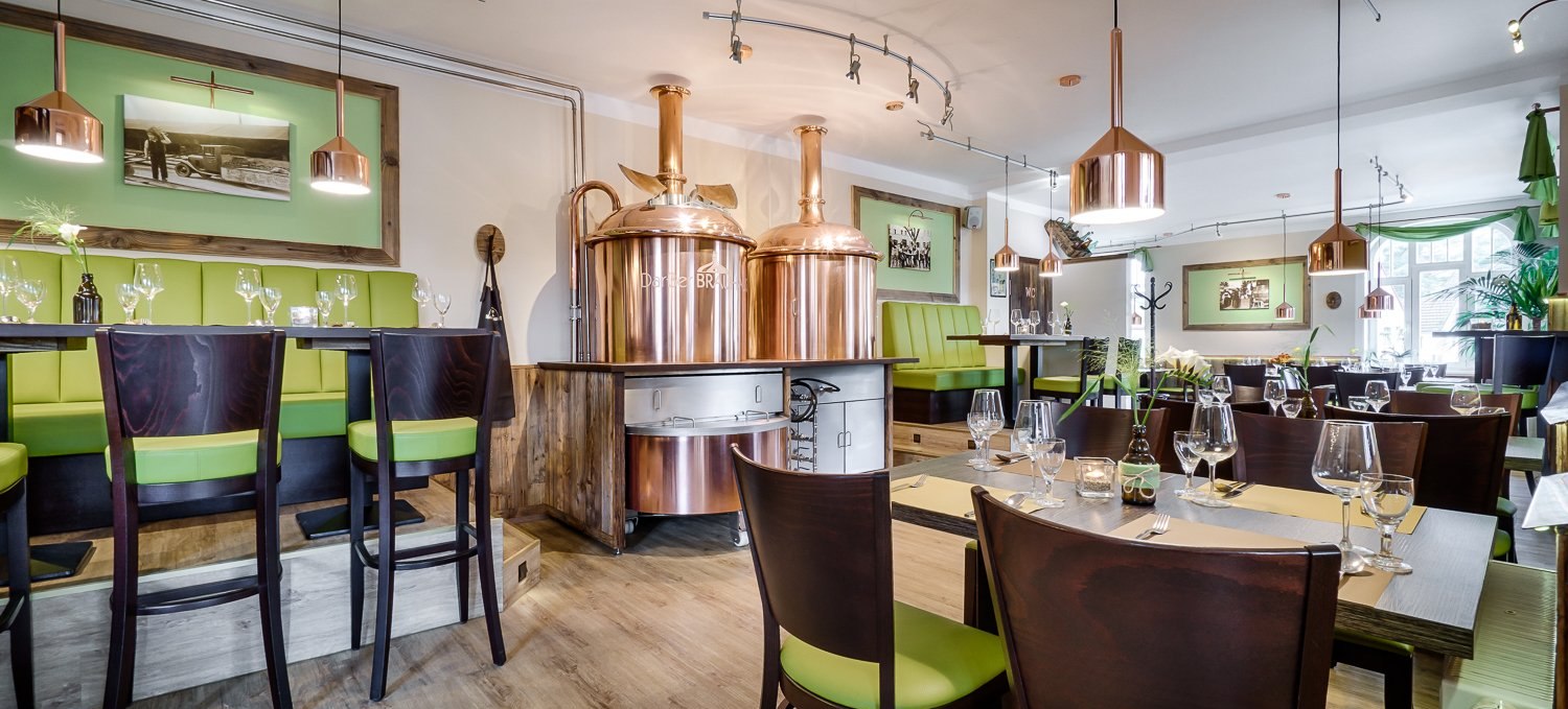 Enjoy your food and drinks in the immediate vicinity of the copper-colored brew kettle and in a beautiful and friendly ambience., © Darßer BRAUHAUS