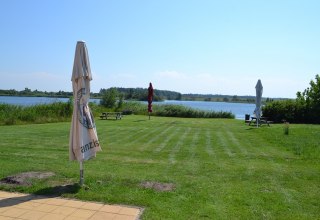 View to the lake over the manicured lawn, © Lutz Werner