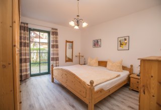 Bedroom in cottage Seeblick, © Ferienkontor