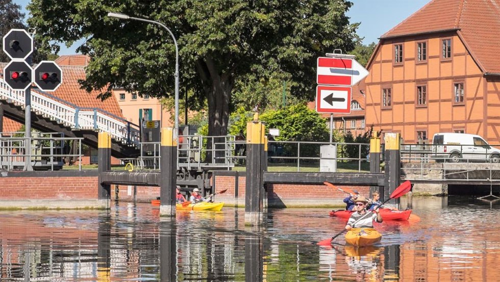 Our beautiful old town tour, past half-timbered and brick houses through the lock under the lift bridge through to Lake Plauer See., © Monty Erselius