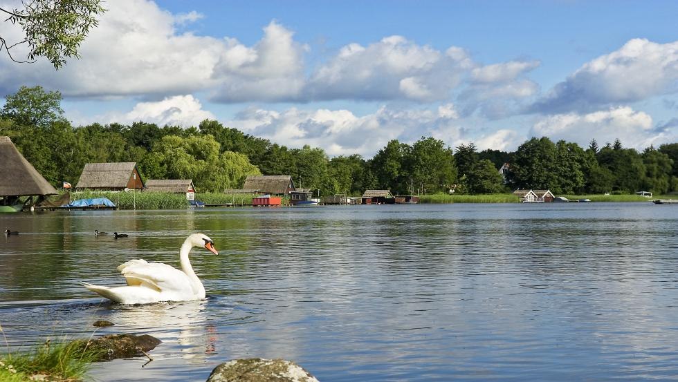 Krakow lake with boathouses, © Frank Eilrich