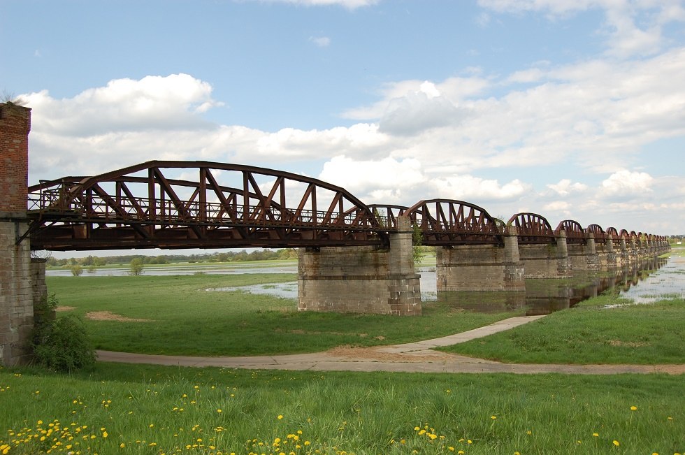 The bridge arches over the Elbe River are a reminder of the former railroad line, which was destroyed at the end of World War 2., © Gabriele Skorupski