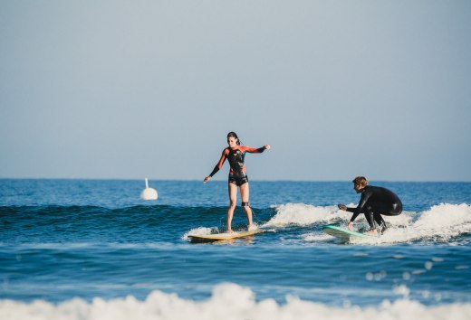 Surfing on the beach of Warnemünde on the Baltic Sea, © TMV/Roth