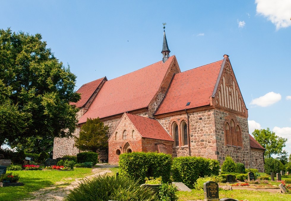 Church photographed sideways obliquely up the slope., © Frank Burger