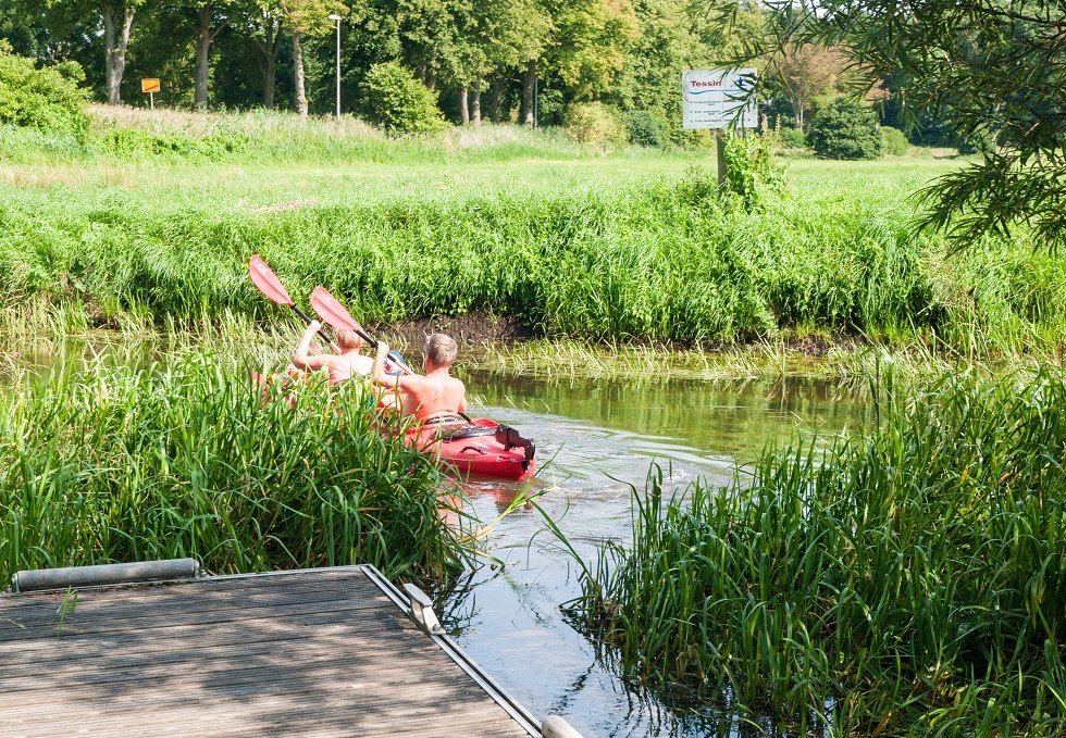 A canoe crew is just casting off from the dock., © Frank Burger