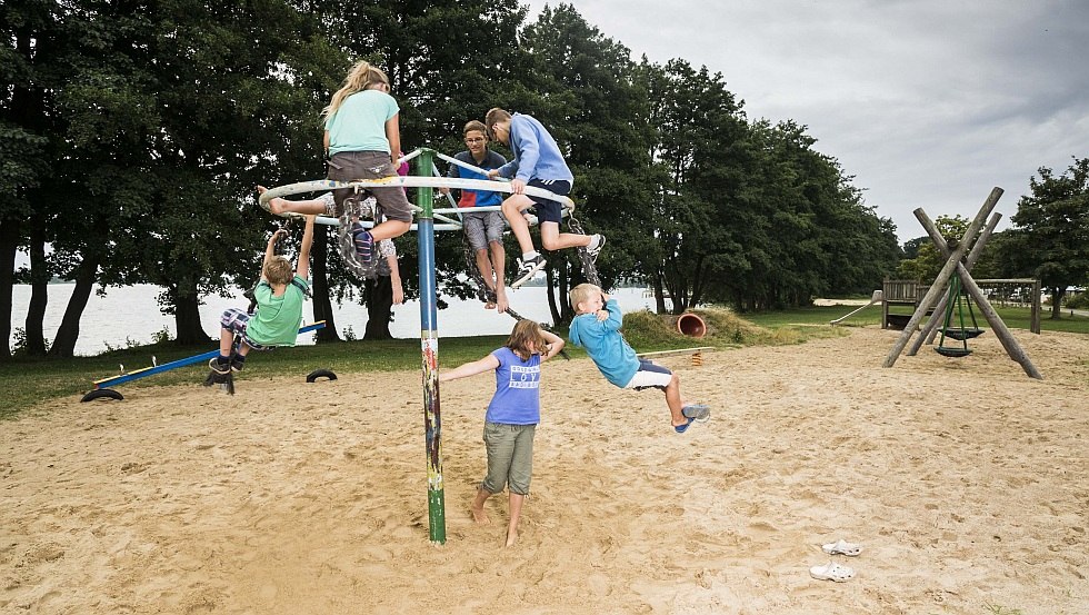 Our large playground with a view of Lake Schwerin, © Campingplatz Seehof GmbH