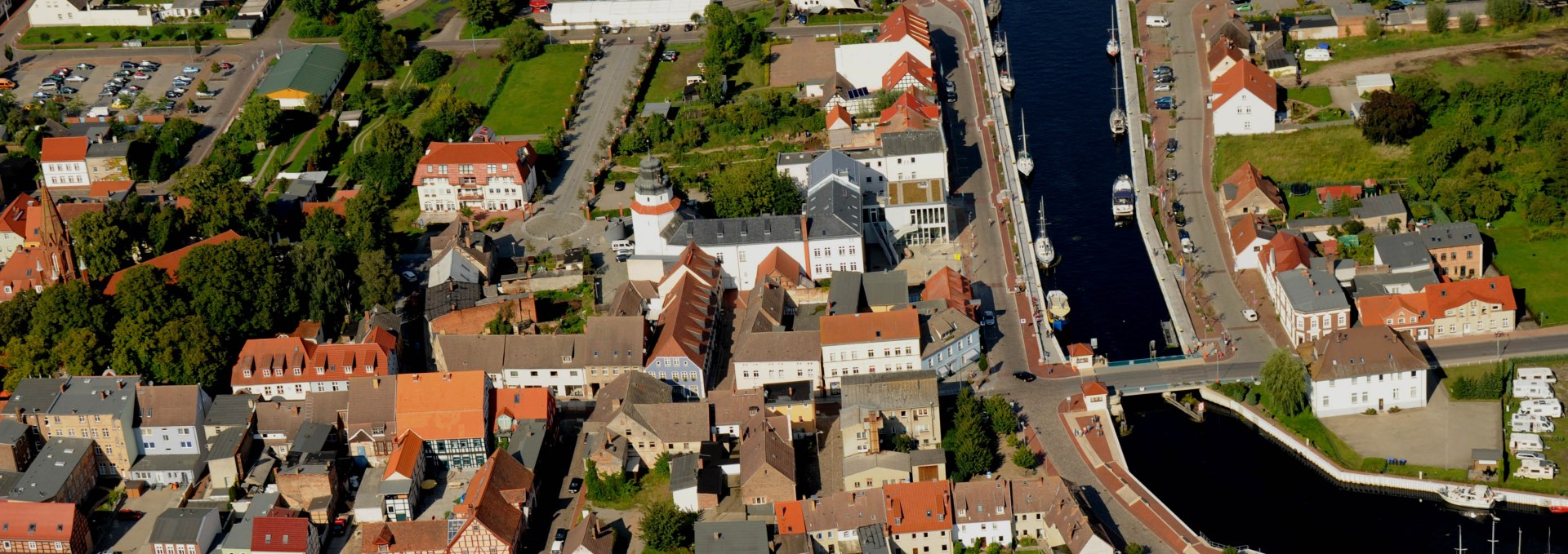 Seaside resort Ueckermünde harbour with an open bascule bridge across the river Uecker, © Walter Graupner