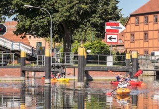 Our beautiful old town tour, past half-timbered and brick houses through the lock under the lift bridge through to Lake Plauer See., © Monty Erselius