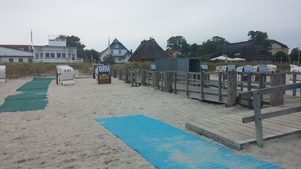 Lined mats allow accessible beach enjoyment, © TSK