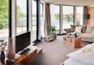 Stylish studios, on request with a fairy-tale lake view, © Hotel Rosendomizil, Malchow