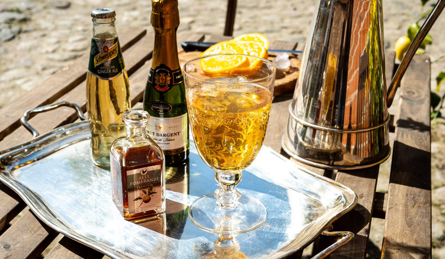 Old bitter orange liqueur as a long drink, © Domusimagess