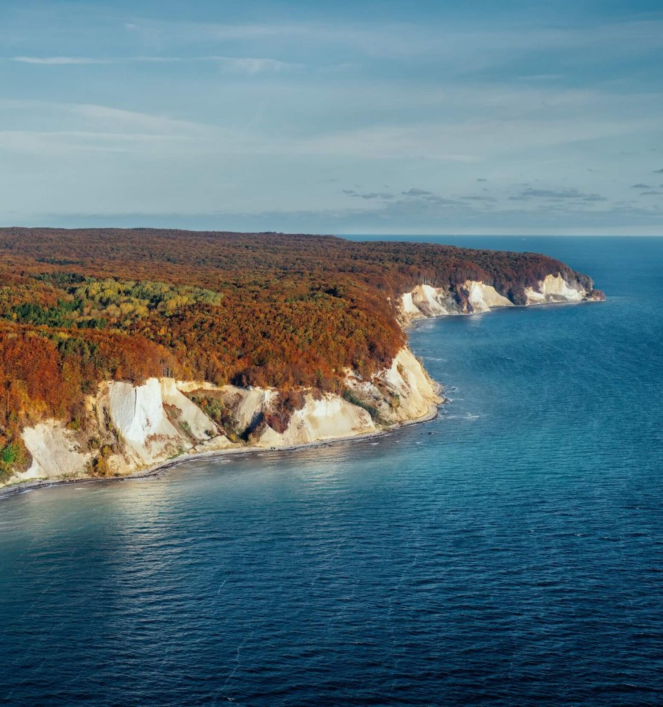 Chalk cliffs in Jasmund National Park at sunrise in the fall