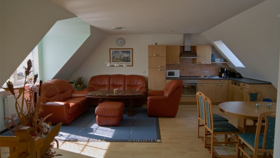 Living room with kitchenette in the apartment Küchenmeister, © Bernd Küchenmeister