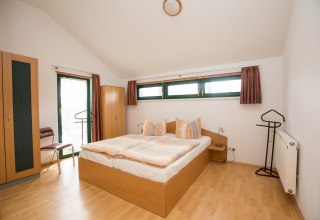 Bedroom in cottage Waldschneise, © Ferienkontor