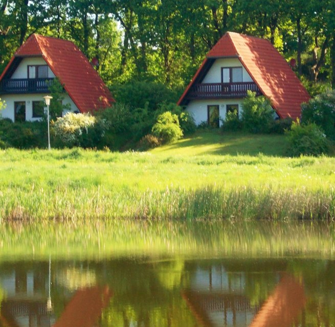 Finnish houses directly on the Recknitz, © Recknitz Tourist