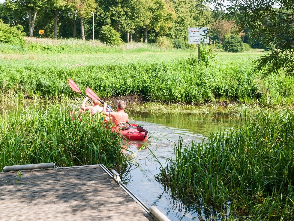 A canoe crew is just casting off from the dock., © Frank Burger