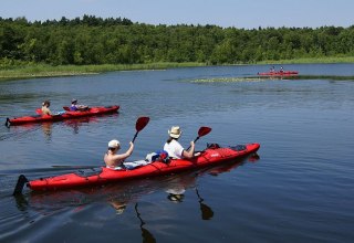 In 2 person hiking kayak near the water lily paradise, © Paddel-Paul/Tobias Schnuchel