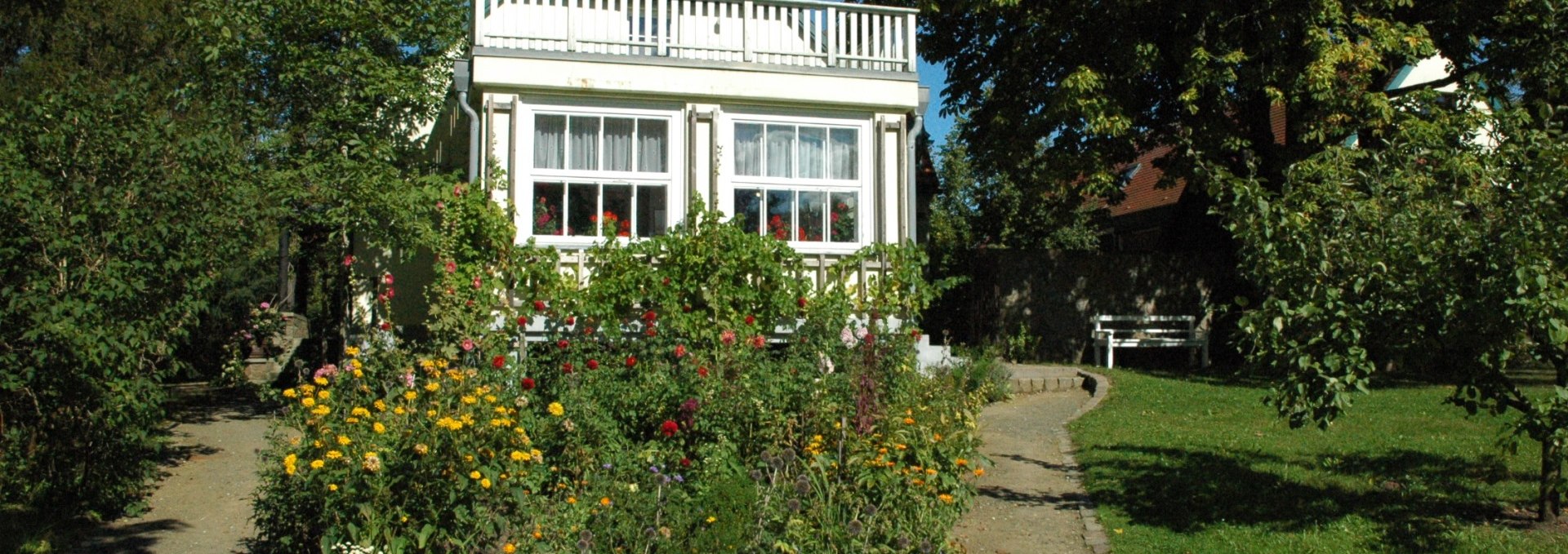 View from the garden to the residential house, © Kurverwaltung Feldberger Seenlandschaft