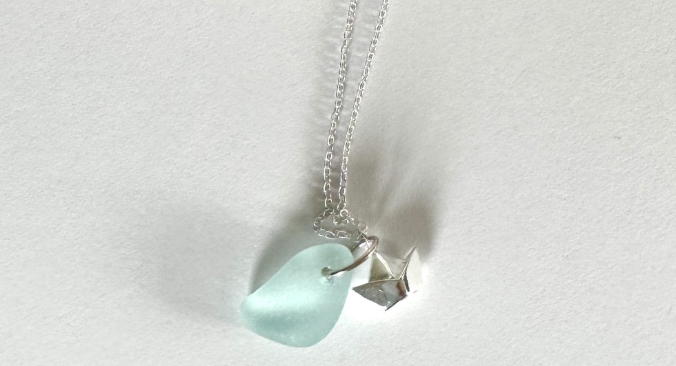 Silver necklace with ship and sea glass, © M. Pracht