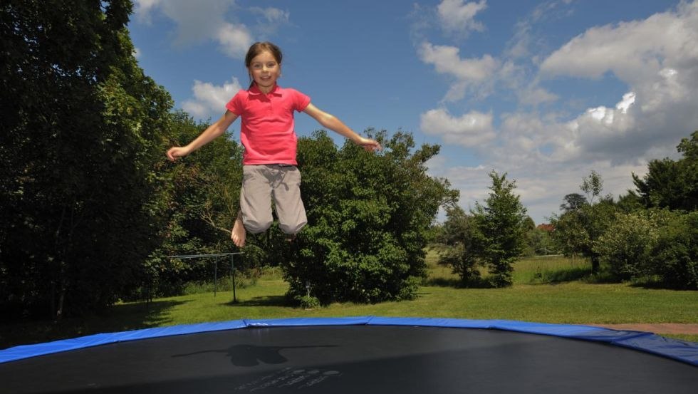 Girl on the trampoline, © Margit Wild