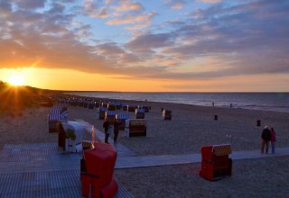 Romantic sunset at the accessible beach access in Baltic resort Trassenheide, © Eigenbetrieb Kurverwaltung Ostseebad Trassenheide