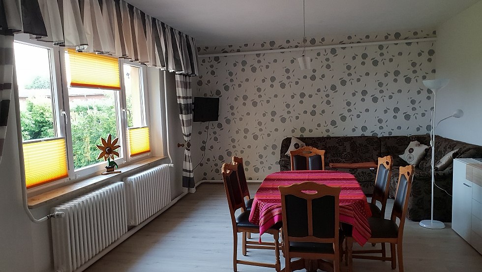 Living room with spacious dining area, © Doreen Fink