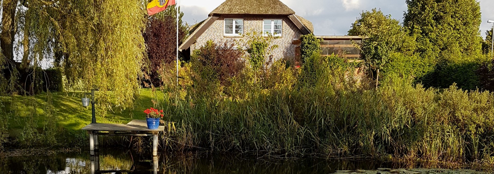 Our pond with a view of the house, © Carola Stier