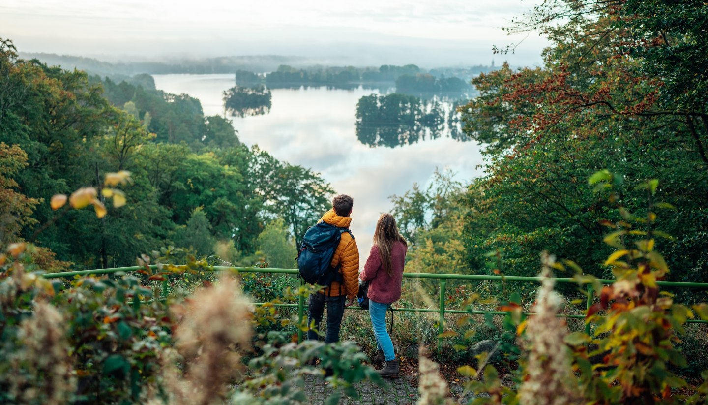 Hiking on the nature park trail at the Reiherberg viewpoint near Feldberg in the fall