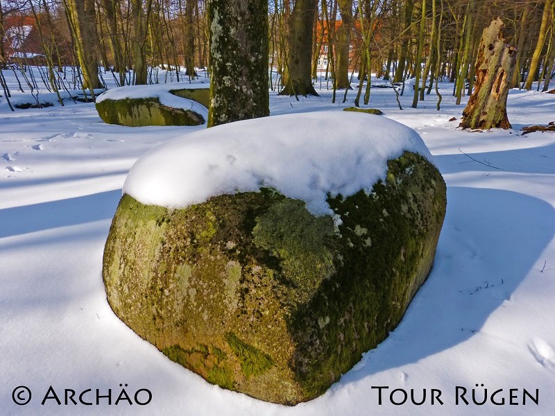 the sacrificial stones at the forester's lodge Werder in the snowy forest of Stubnitz, © Archäo Tour Rügen