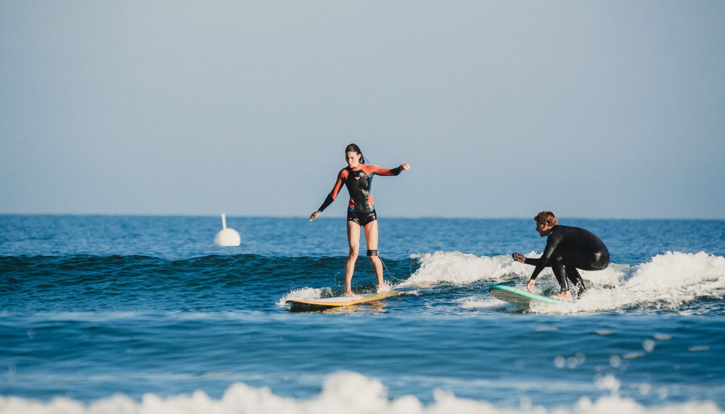 Surfing on the beach of Warnemünde on the Baltic Sea, © TMV/Roth