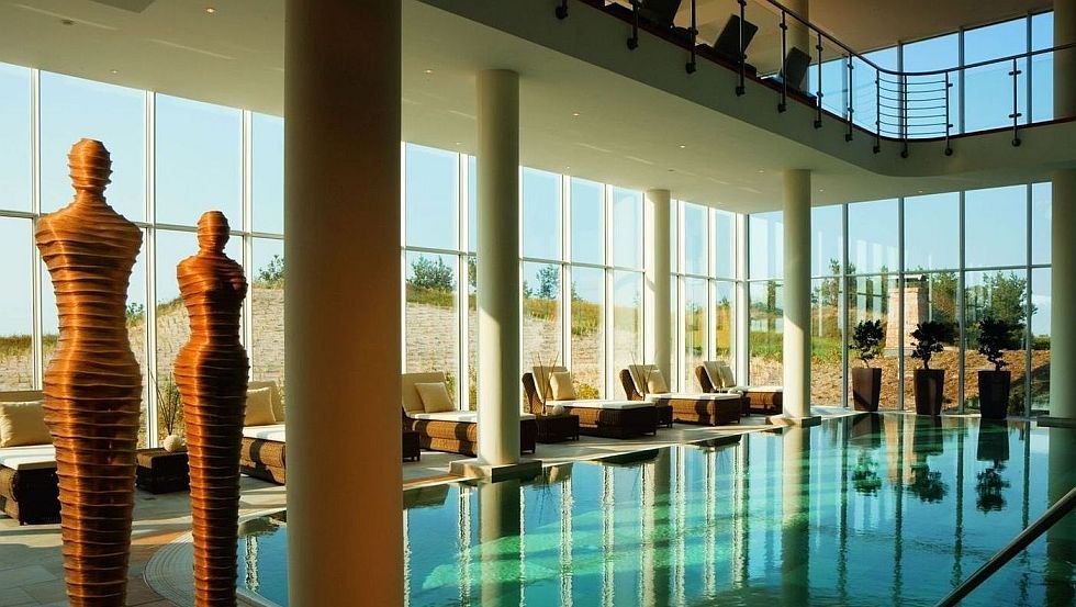 A generous view of the dune landscape from the pool of the Dune Sea Spa, © Strandhotel Dünenmeer