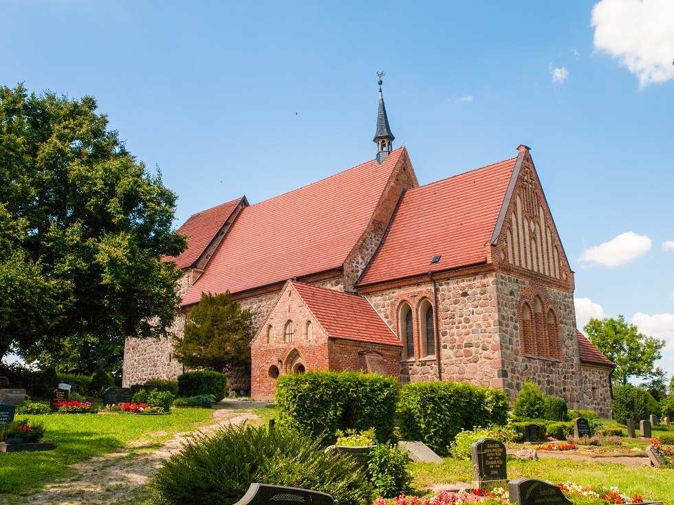 Church photographed sideways obliquely up the slope., © Frank Burger