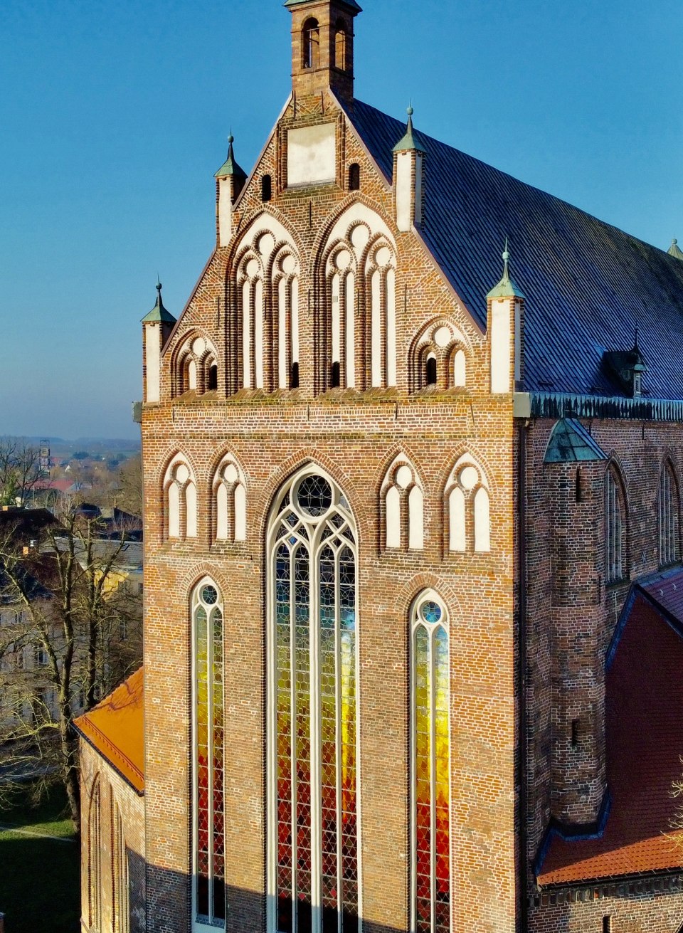 St. Nikolai Cathedral in Greifswald with colorful windows as light art.