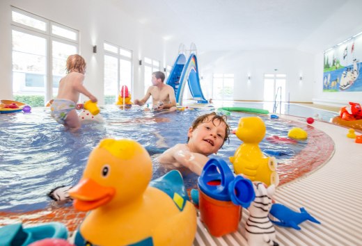 With the water slide, countless squeaking ducks, watering cans, buckets and co. there is always plenty to do in the toddler pool., © Wonnemar Wismar